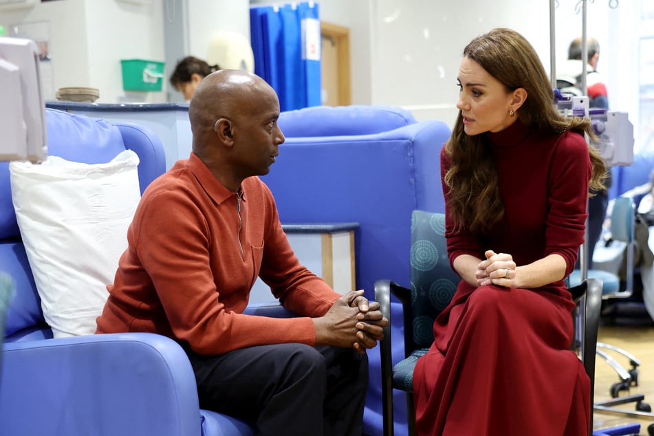 Kate Middleton (r.) said she was "in remission" from cancer after she visited the specialist London hospital where she was treated.