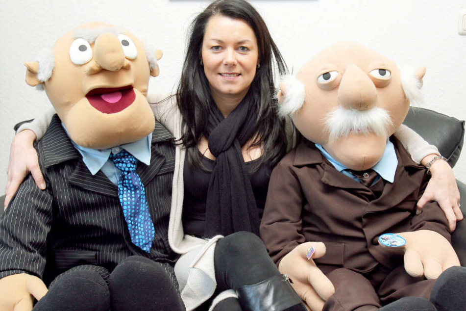 Das Archivbild aus dem Jahr 2009 zeigt links und rechts die Figuren "Waldorf & Statler", zwei notorische Querulanten aus der Muppet Show.