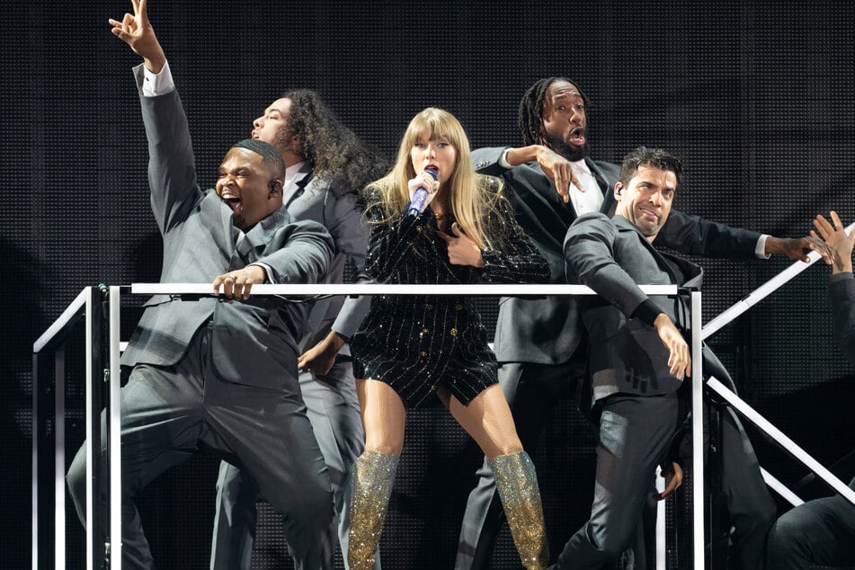 Taylor Swift (c.) will finish out The Eras Tour in December.