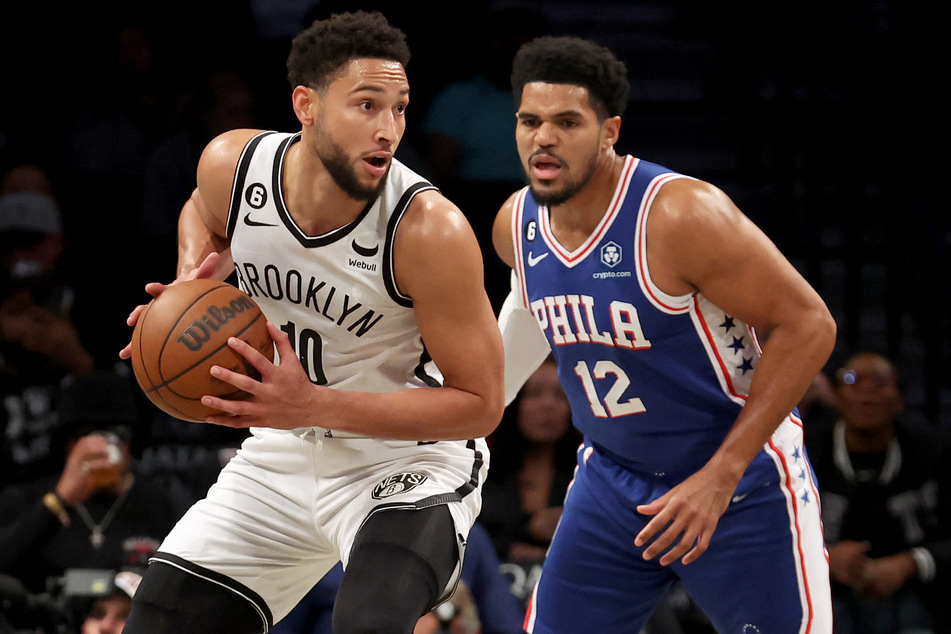 Brooklyn Nets guard Ben Simmons (l.) showed off in his first NBA game in 470 days against his former team, the Philadelphia 76ers, on Monday night.