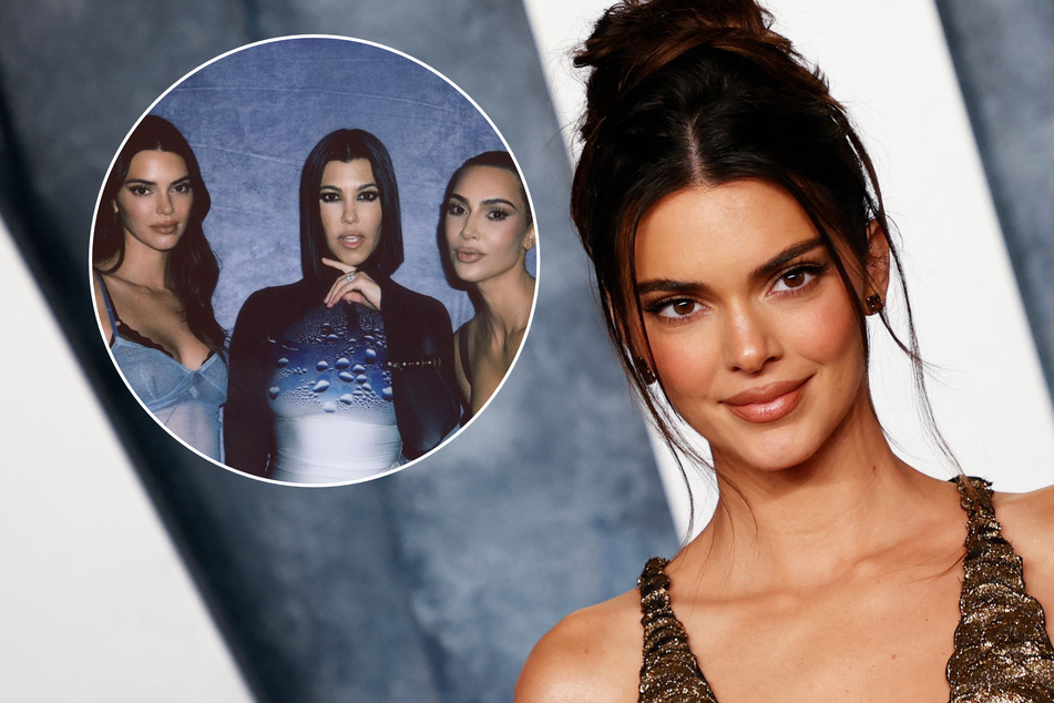 Kendall Jenner (r) has revealed she doesn't always feel like she fits in with her famous sisters.