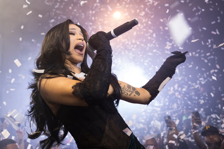 Cardi B (pictured) has reportedly been asked to perform at the capital of Hainan in southern China following Kanye West's sold-out shows last year.