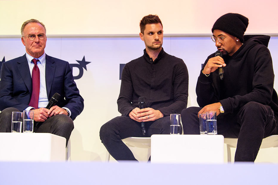 Karl-Heinz Rummenigge (l.) und Jérôme Boateng (r.) sind momentan nicht einer Meinung.