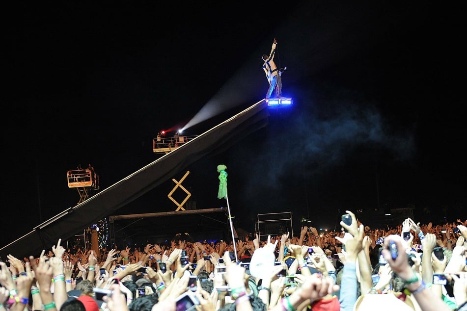 Kanye "Ye" West performing at the 2011 edition of Coachella.