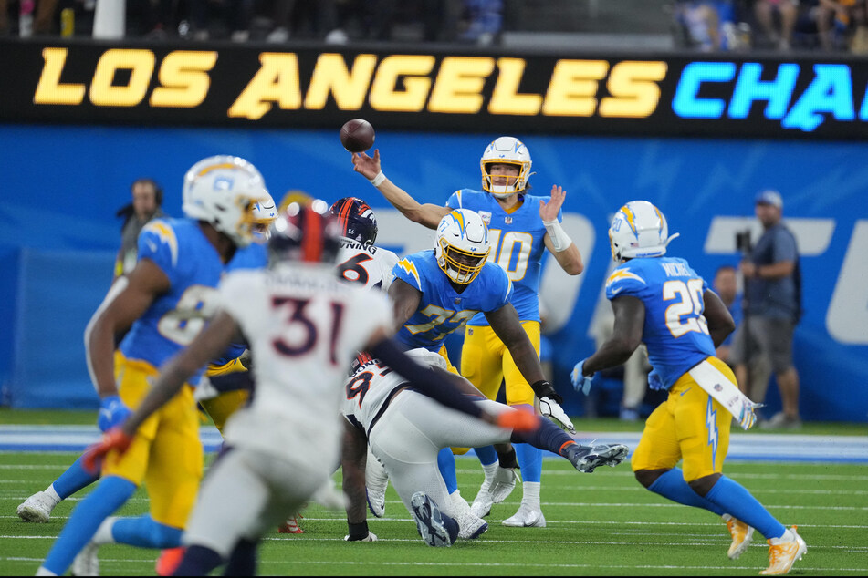 Los Angeles Chargers quarterback Justin Herbert throws the ball in the second half against the Denver Broncos at SoFi Stadium.