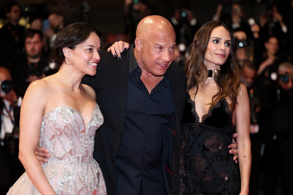 From l. to r.: Michelle Rodriguez, Vin Diesel, and Jordana Brewster arrive for the screening of The Fast and the Furious at the 79th edition of the Cannes Film Festival on May 13, 2026.