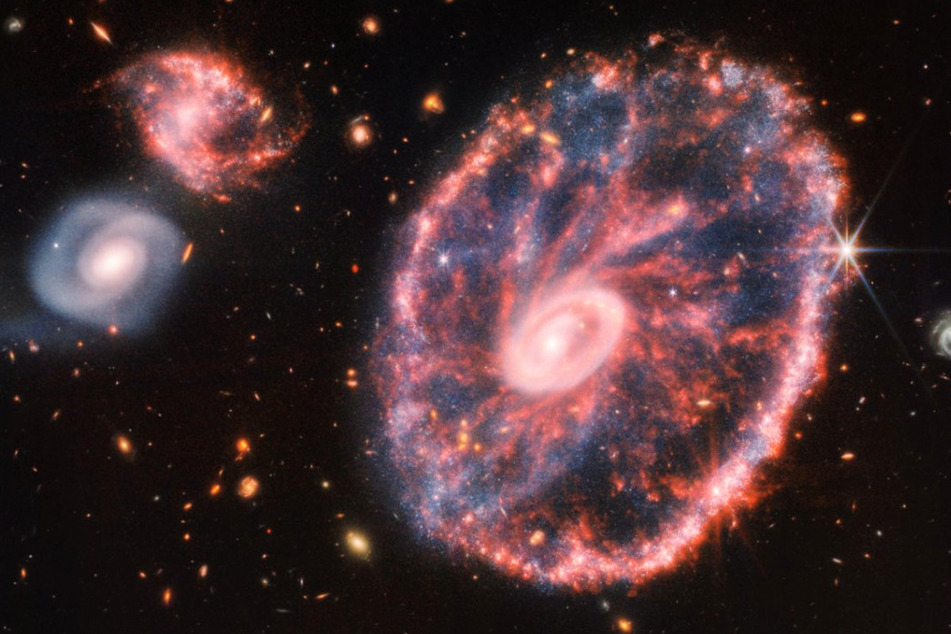 The Cartwheel Galaxy is located around 500 million light years away.