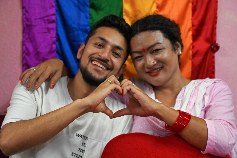 Surendra Pandey (l.) and Maya Gurung, who is transgender, made history with the recognition of their marriage certificate in Nepal.