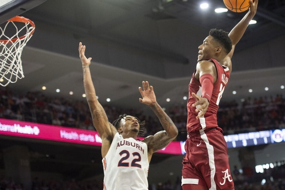 On Wednesday, Brandon Miller (r) scored a career-high of 41 points, the most points by an Alabama freshman in program history, against the South Carolina Gamecocks.