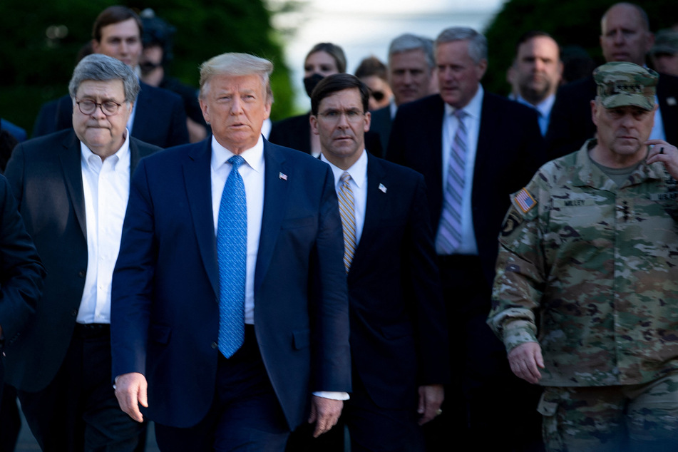 Milley (r.) was forced to apologize after participating in Trump's infamous photo-op in front of St. John's Church in Washington DC.