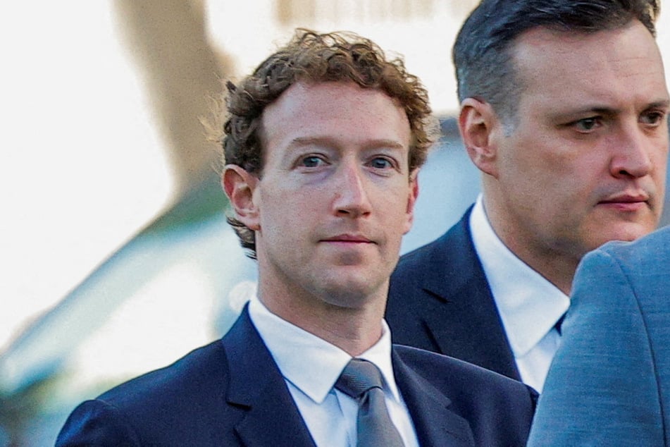 Meta Platforms CEO Mark Zuckerberg arrives outside court to take the stand at trial in a key test case accusing Meta and Google's YouTube of harming kids' mental health in Los Angeles, California, on February 18, 2026.