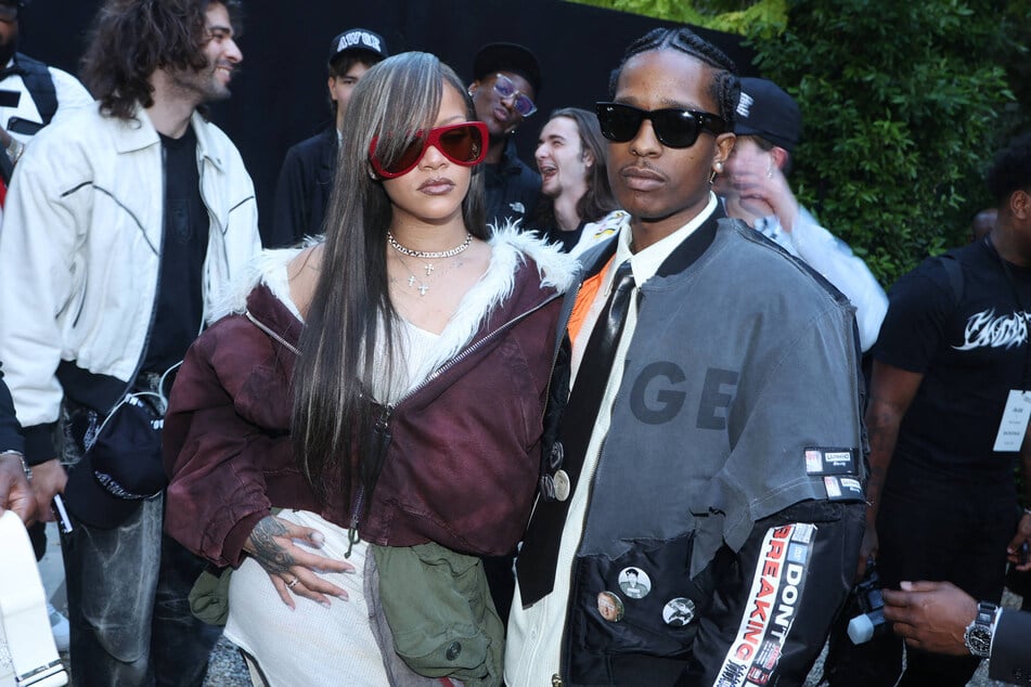 Rihanna and A$AP Rocky (r.) were decked out in Bottega Veneta looks for Milan Fashion Week.