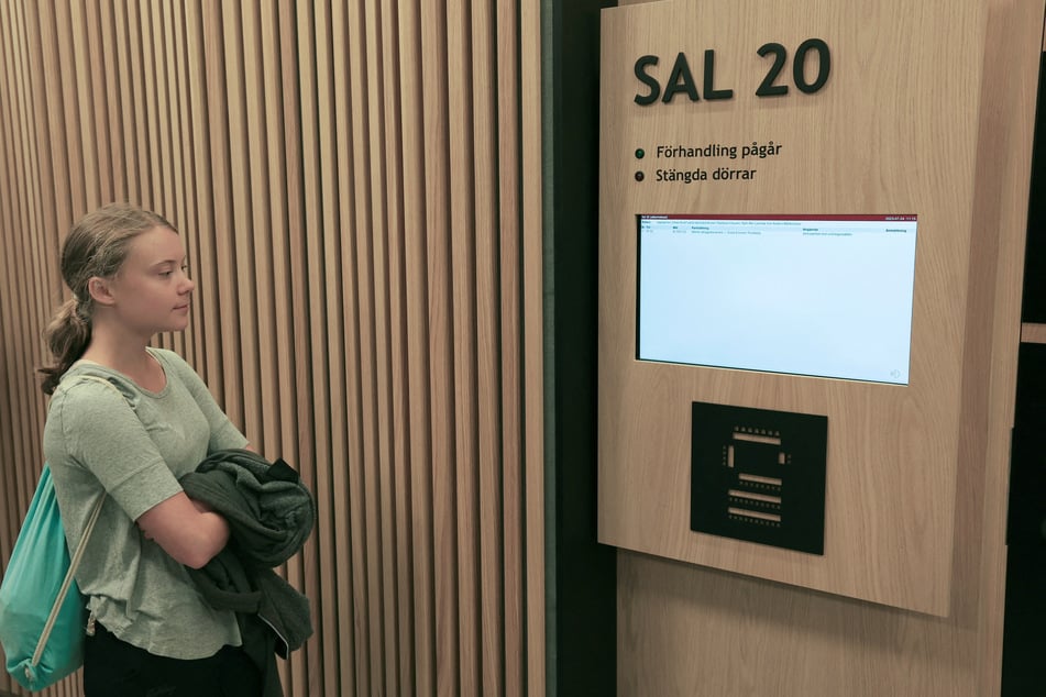 Greta Thunberg stands at the Malmö District Court in Sweden on July 24, 2023.