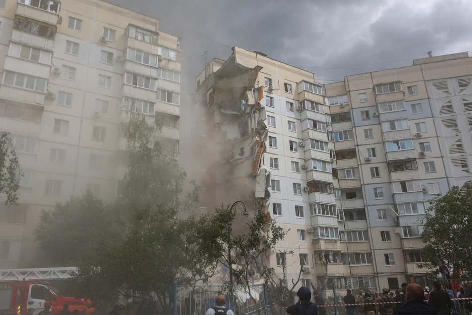 This photograph shows a view of a partially collapsed apartment building which was damaged by a Ukrainian strike in Belgorod on May 12.