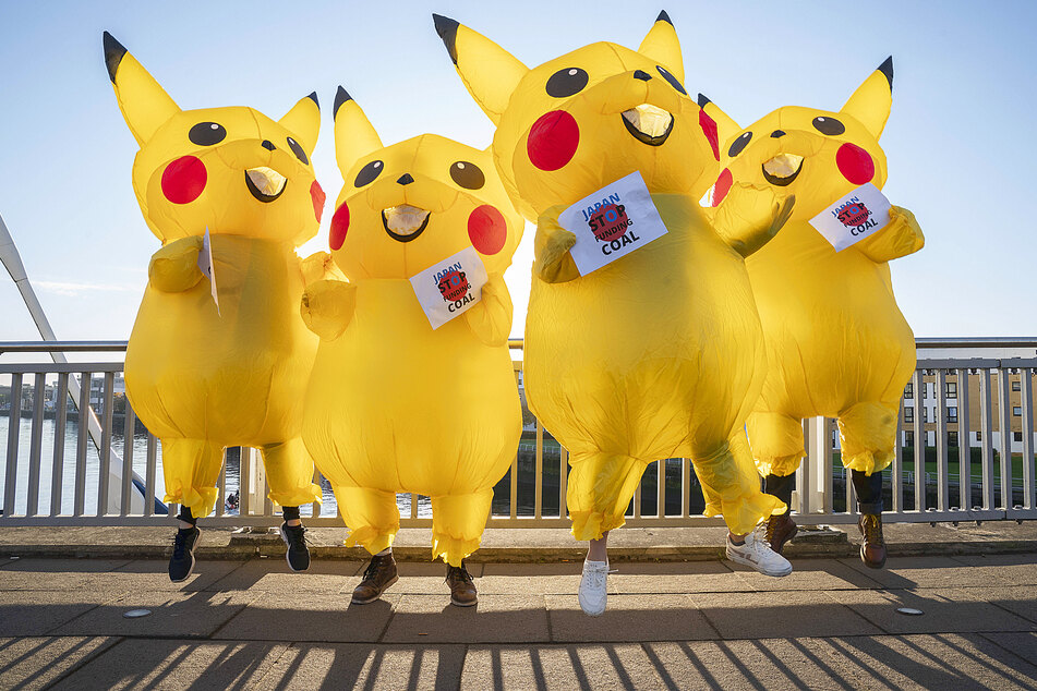 Pikachus joined activists from the No Coal Japan coalition, at Pacific Quay opposite the Glasgow COP26 campus, to demand Japan stop financing overseas coal projects and phase out domestic coal by 2030.