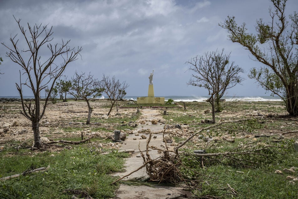 A general view shows debris washed ashore by high waves at a park in the aftermath of Super Typhoon Bavi in Guam on Tuesday.