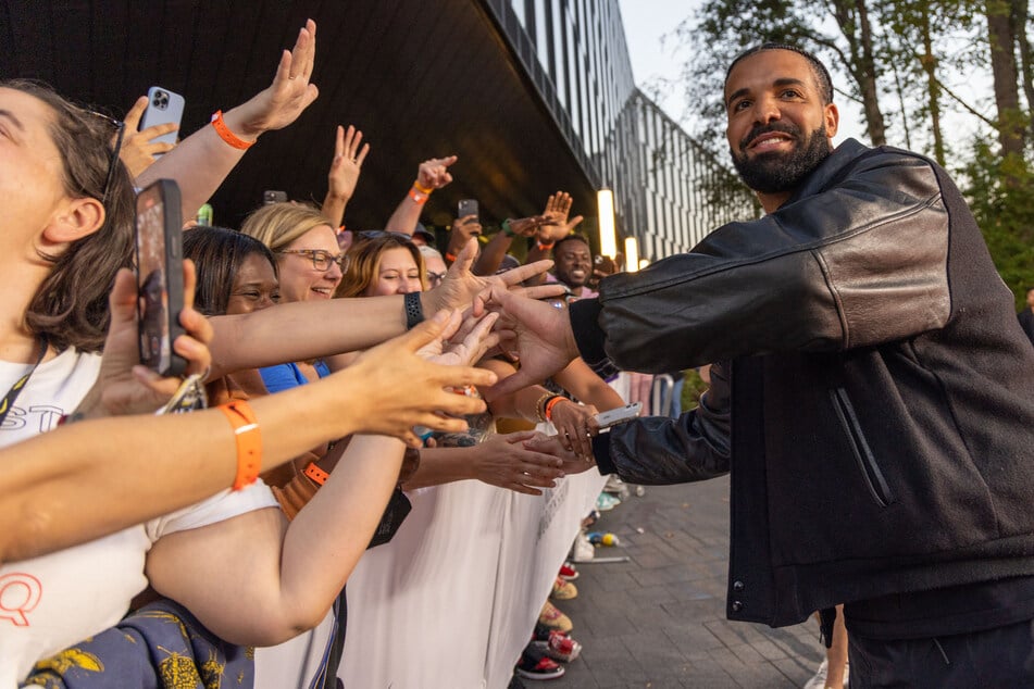 Drake greets Nike employees at NIKE, Inc in Beaverton, Oregon.