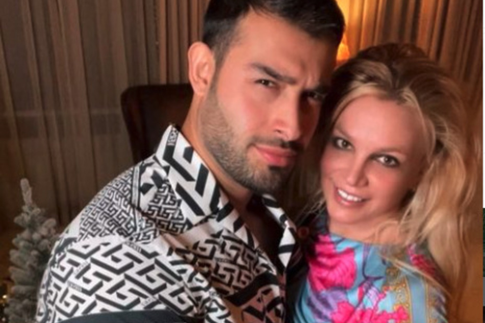 Sam Asghari (l) shared that his wife, Britney Spears, is "amazing"and "doing well" following their intimate wedding.