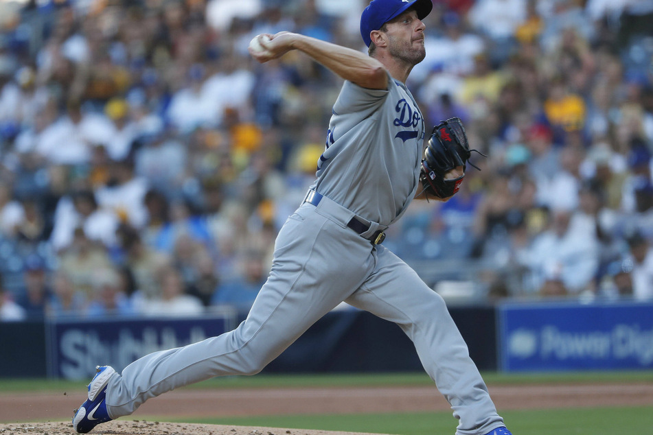 Dodgers pitcher Max Scherzer struck out 10 on the way to his 12th win of the season over the Padres on Thursday night.