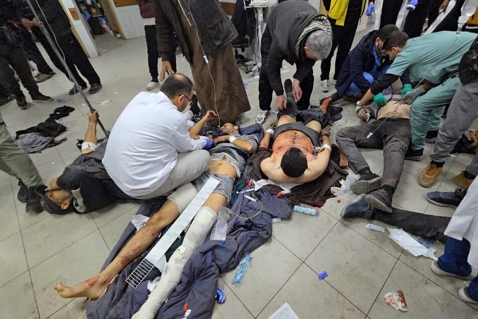 Victims are treated inside the Kamal Adwan hospital in Beit Lahia in the northern Gaza Strip, following Israeli strikes around the medical complex on December 6, 2024.