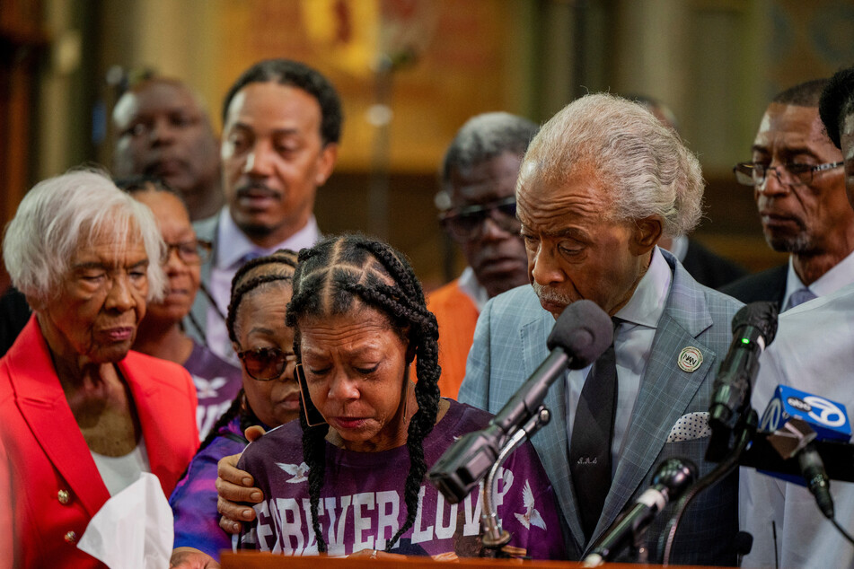 Rev. Al Sharpton comforts Donna Massey, the mother of Sonya Massey, during a press conference and rally at New Mount Pilgrim Missionary Baptist Church in Chicago, Illinois.