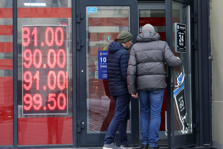 A currency exchange office in Moscow displaying the current rates for the ruble-dollar exchange.