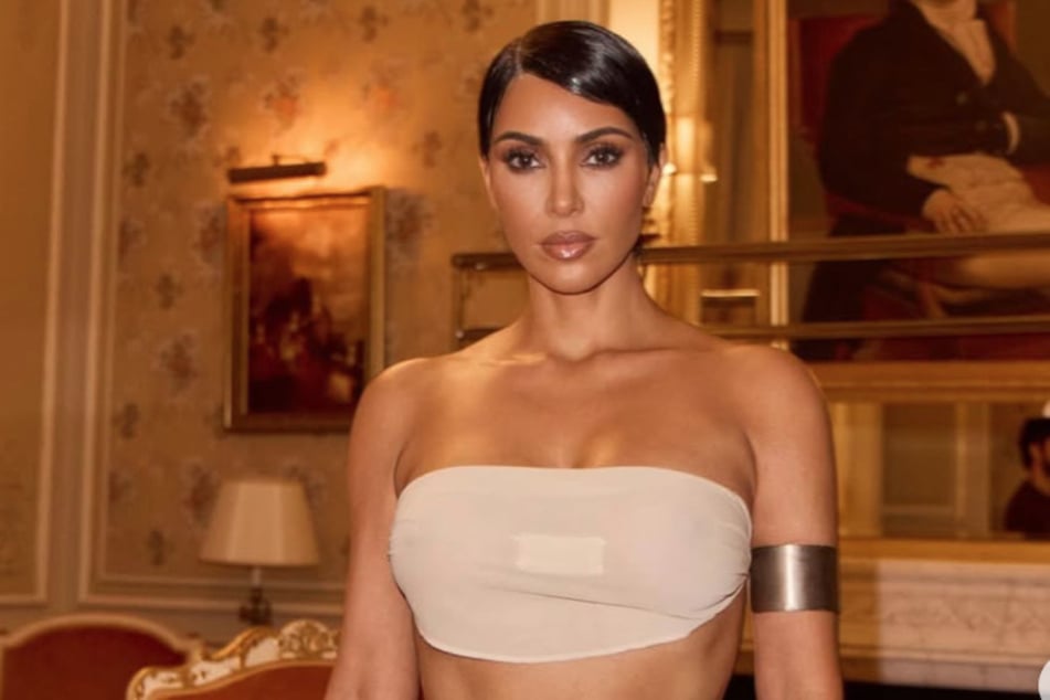 Kim Kardashian freed the nipple and rocked a daring pixie cut for Paris Fashion Week.