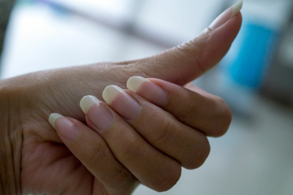 Healthy nails should be a natural pink without ridges or discolorations.