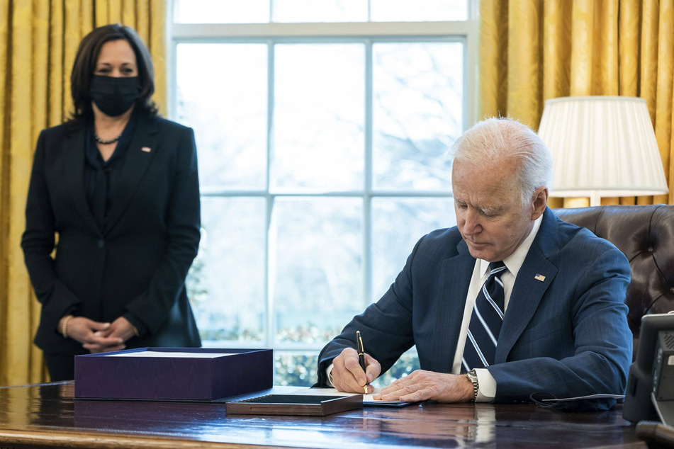 President Joe Biden signed the American Rescue Plan into law as Vice President Kamala Harris looked on.