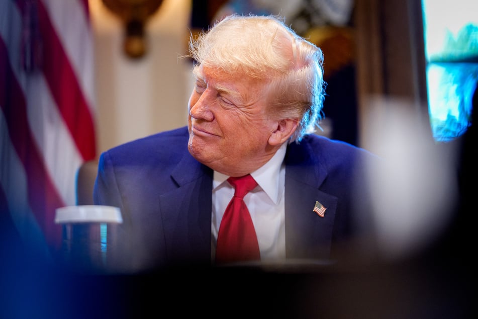 President Donald Trump signed an order on Thursday to lower tariffs on Japanese autos, as Washington moves to implement its trade pact negotiated with Tokyo.