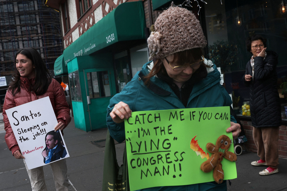 Protestors rally against newly elected Rep. George Santos, who now may be at the center of yet another scandal over a dying dog.