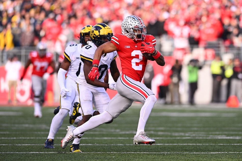 Ohio State will have an edge over Michigan to make the Playoff bearing a loss due to its challenging non-conference schedule.