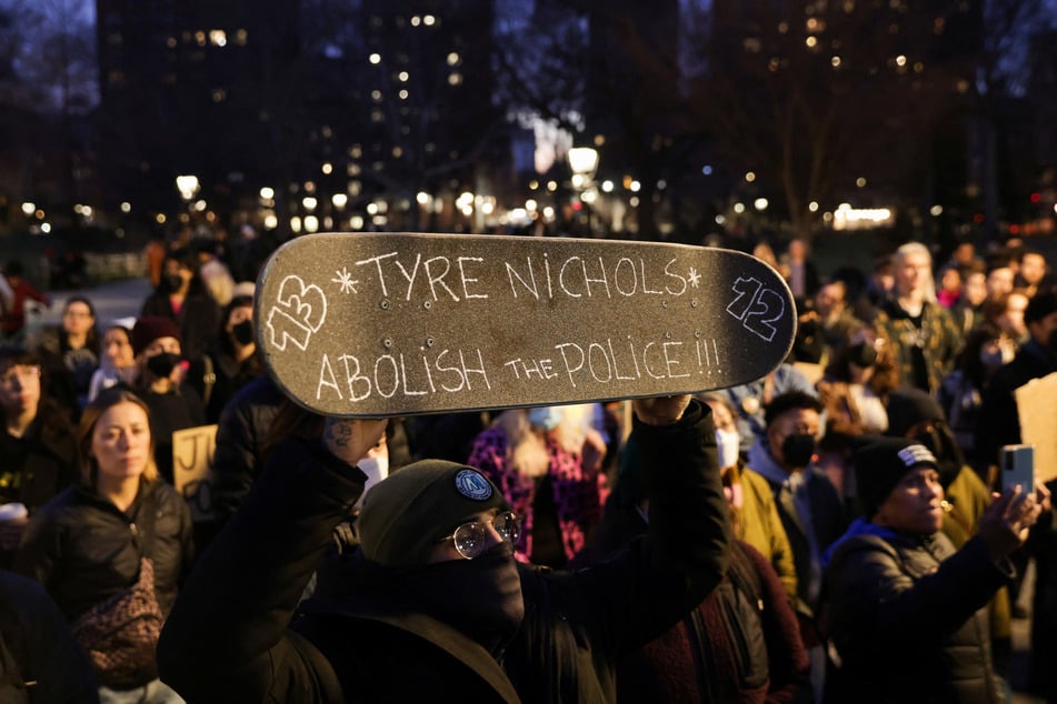 People take part in a protest in New York City following the release of a video showing police officers beating Tyre Nichols.