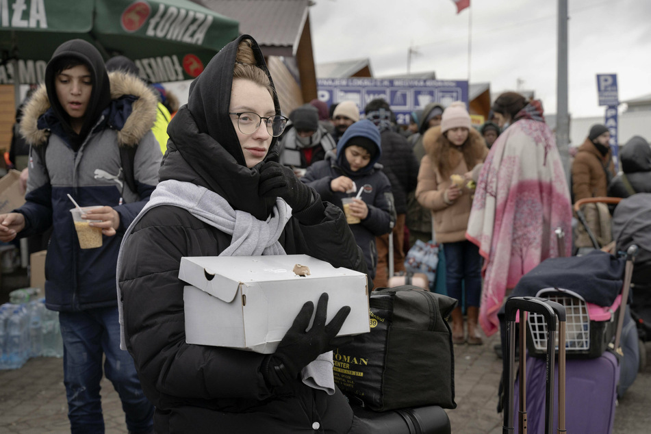 Refugees fleeing the war in Ukraine at the border crossing at Medyka in southern Poland.