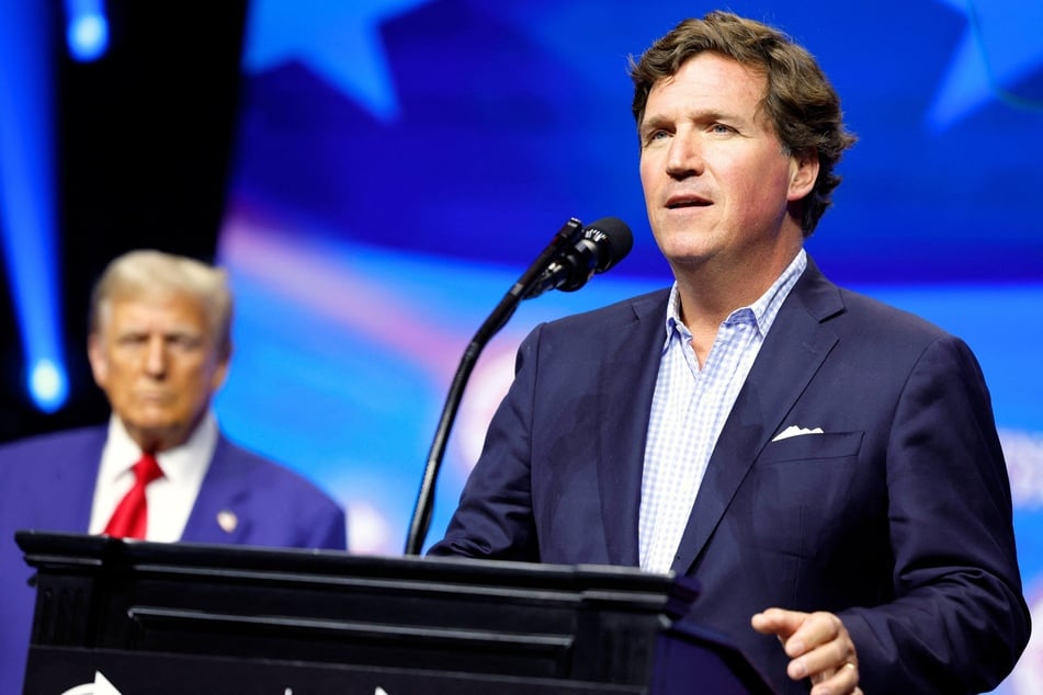 During a recent event, political commentator Tucker Carlson gave a bizarre speech about how Donald Trump will give America a "spanking" if he wins.