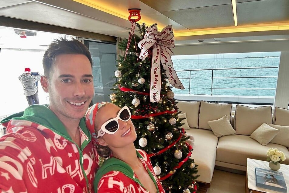 Paris Hilton and her husband Carter Reum celebrated Christmas on a private yacht.