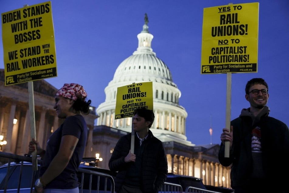 Activists in support of unionized rail workers protest outside the US Capitol Building on November 29, 2022, in Washington DC.