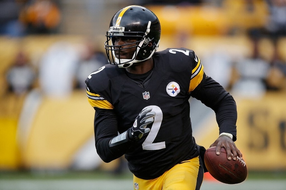 Mike Vick #2 of the Pittsburgh Steelers looks to pass during a game at Heinz Field in Pittsburgh, Pennsylvania.