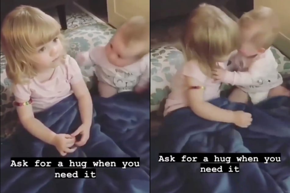 This baby really wanted a hug form her big sister.