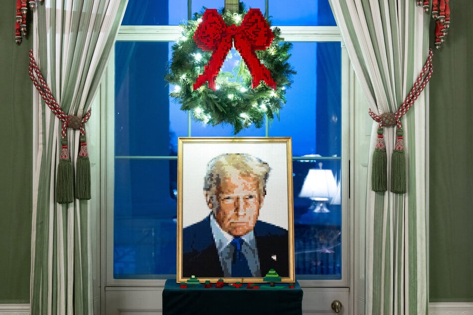 A portrait of President Donald Trump made out of Legos is pictured as part of Christmas decorations in the Green Room of the White House.