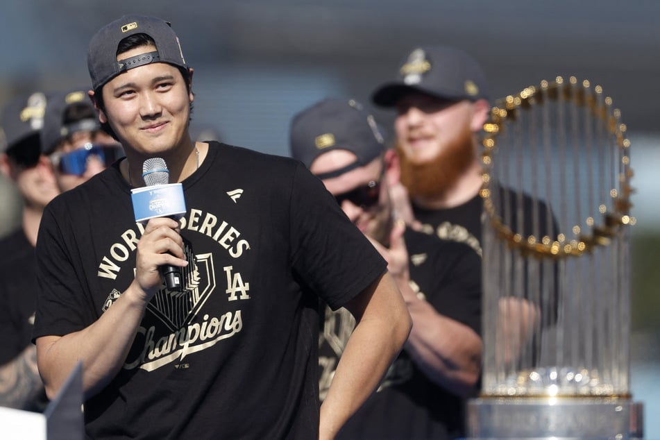 Shohei Ohtani speaks to the crowd during the 2025 Dodgers World Series Celebration at Dodger Stadium on November 3, 2025.