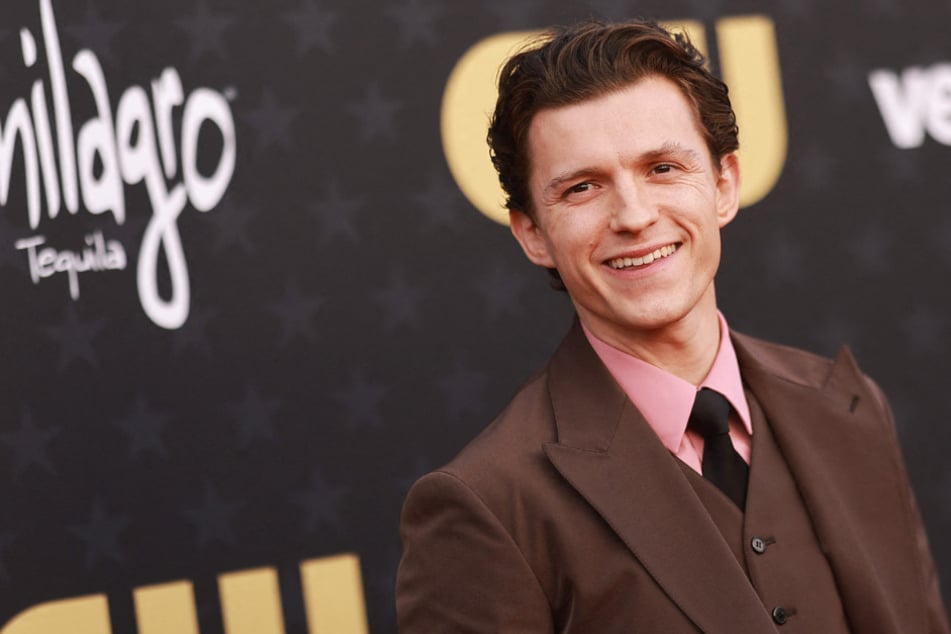 Tom Holland is bouncing back after suffering a concussion on the set of Spider-Man: Brand New Day, reassuring fans he's already on the mend.