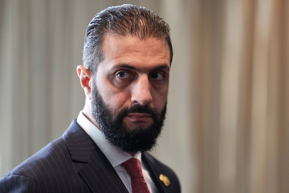 The US envoy for Syria said Damascus's interim President Ahmed al-Sharaa (pictured) will travel to DC and may sign an agreement joining an alliance against the Islamic State.