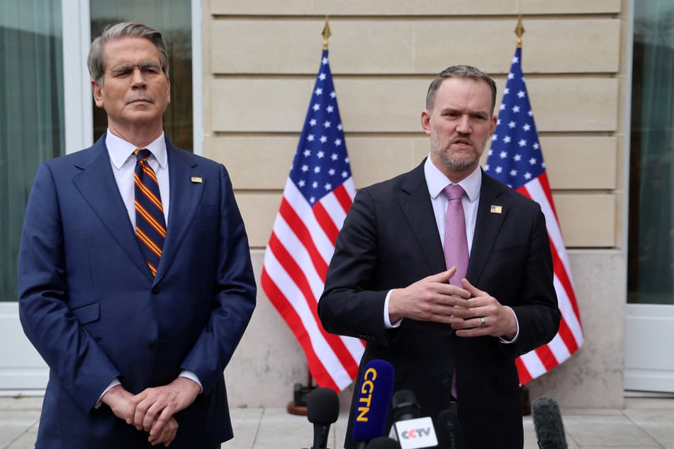 US Trade Representative Jamieson Greer (r.) addresses journalists next to US Treasury Secretary Scott Bessent following a new round of talks with Chinese officials at the OECD Headquarters in Paris, France, on March 16, 2026.
