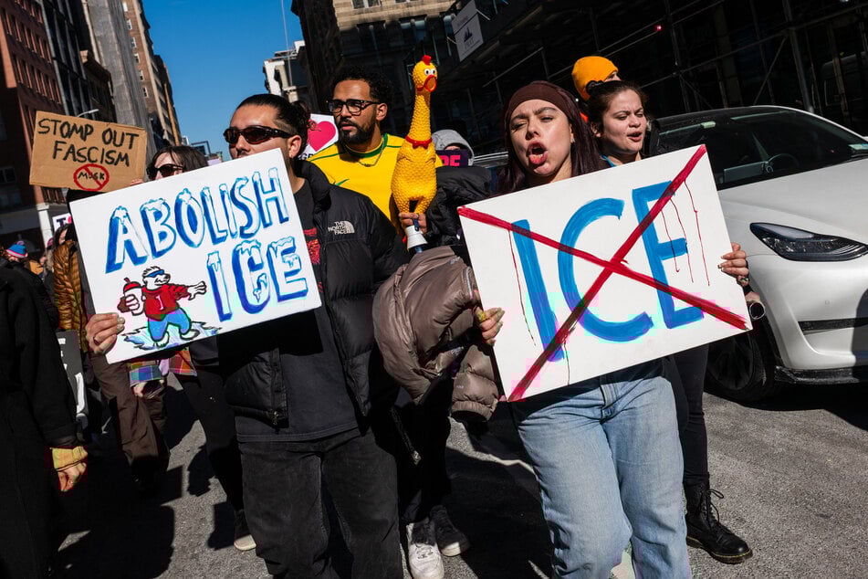 Protesters in New York City raise signs calling for the abolition of US Immigration and Customs Enforcement.