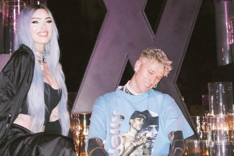 Megan Fox and Machine Gun Kelly (r.) were spotted having a sweet moment at this year's Stagecoach festival.