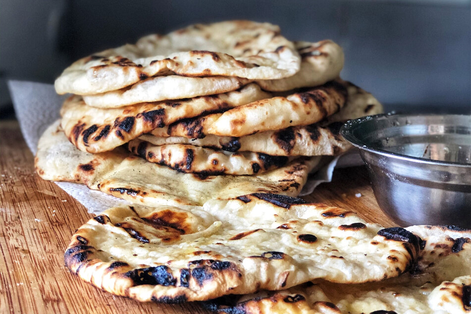 Naan bread is but one of many fantastic things you can serve alongside butter chicken.