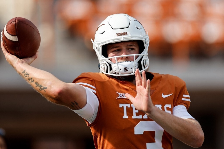 Quinn Ewers of the Texas Longhorns warms up before the game against the Alabama Crimson Tide at Darrell K Royal-Texas Memorial Stadium.