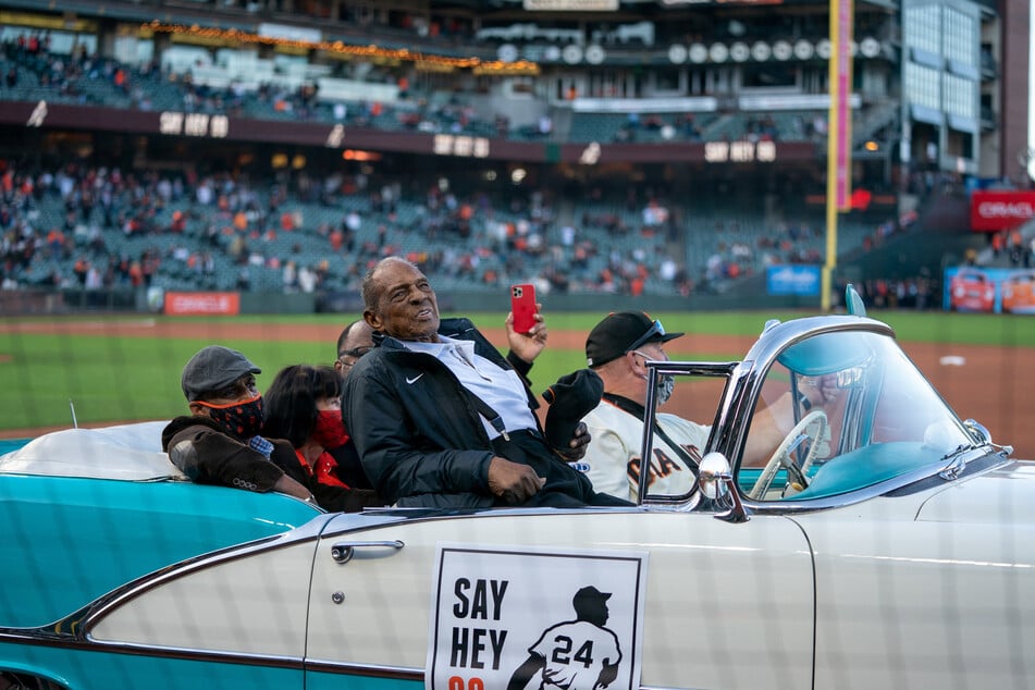 Willie Mays celebrates his 90th birthday with fans at Oracle Park in May 2021.