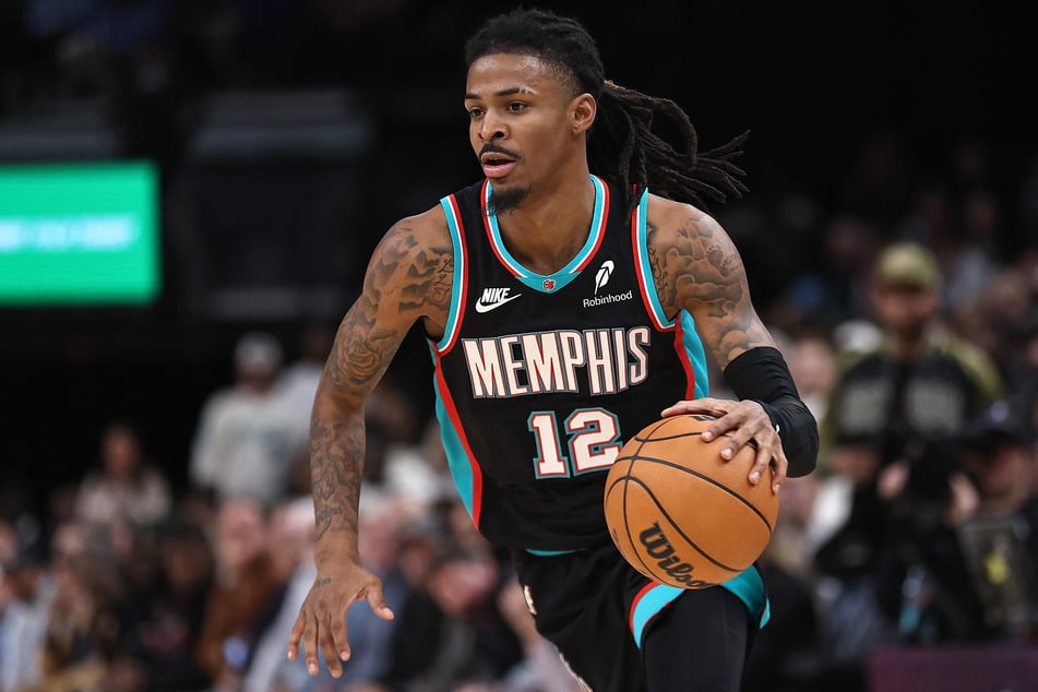 Ja Morant of the Memphis Grizzlies handles the ball during overtime against the Philadelphia 76ers at FedExForum on December 30, 2025.